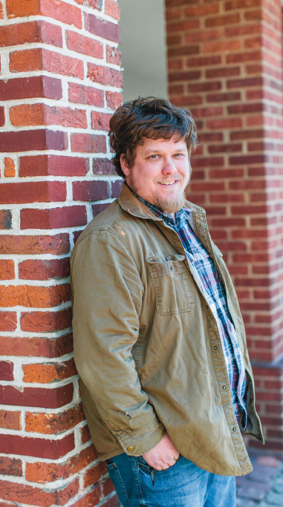 Ben Wenk at an early Headhouse Farmers Market in Philadelphia's Old City neighborhood. Photo credit: Courtney Apple.